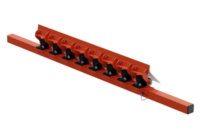 Martin Engineering's new secondary conveyor belt cleaner features a latch pin that releases the cartridge from the mainframe allowing cartridge removal and replacement