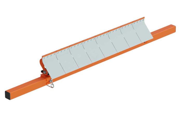 Deflector shields direct carryback into the discharge chute to prevent fouling the mainframe for easier maintenance