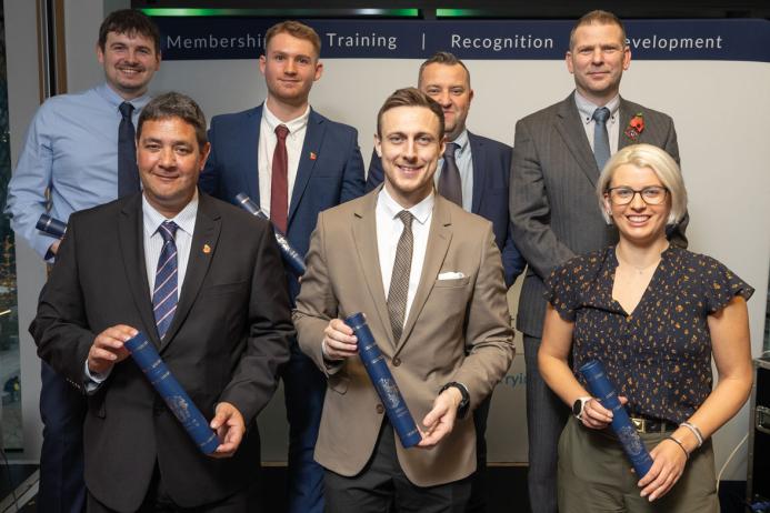 IQ Student Award winners. Back row (L-R): Jordan Eccles, Lewis Malone, John Bright, Adam Baker; Front row (L-R): Gregg Loan, Haydn Griffiths, Sallie Antill