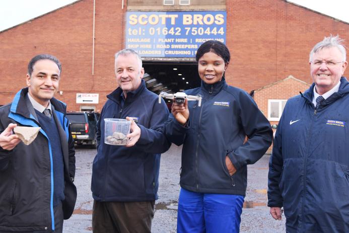 L-R: Dr Sina Rezaei Gomari, Peter Scott, KTP associate Eghe Ikponmwosa-Eweka, and Bob Borthwick with the clay that will be used in the artificial soil as well as a drone that will monitor the test site