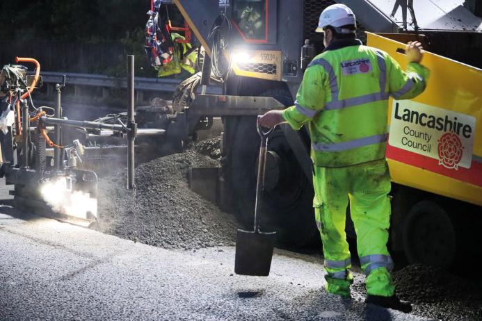 Laying of asphalt