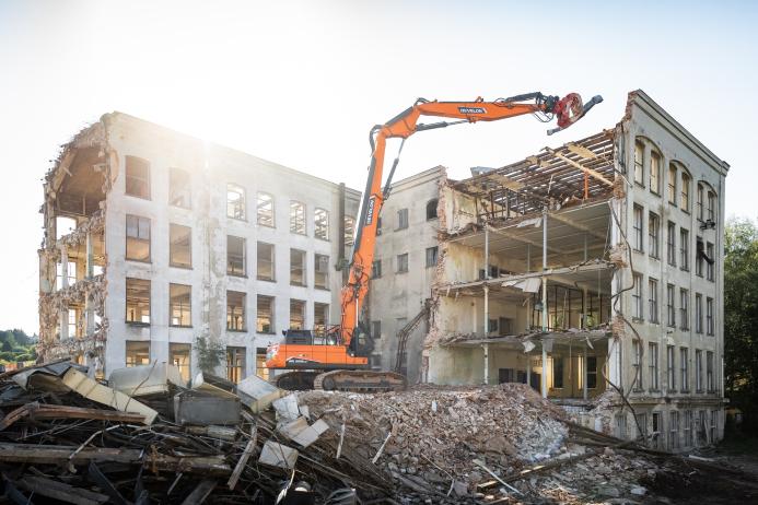 Develon DX380DM-7 demolition excavator in operation 