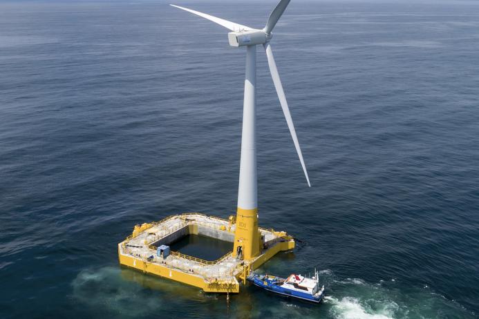 Offshore wind turbine with floating concrete foundation