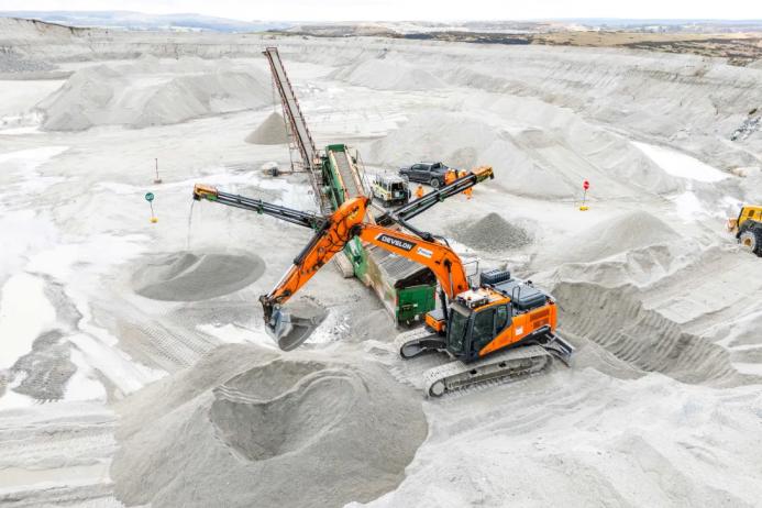 The trial took place at Holcim UK’s Lee Moor sand and gravel quarry, near Plymouth, and involved a 23-tonne Develon crawler excavator fitted with autonomous technology from Gravis Robotics