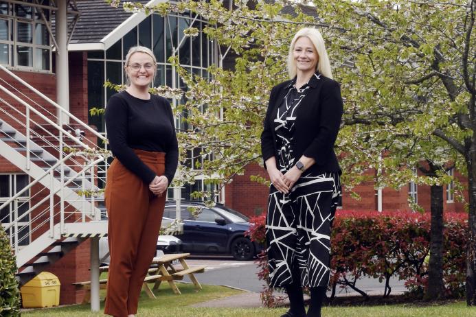 L-R: Emma Turner with Terri Charles outside the Business Innovation Centre in Binley, where Cemex have opened a new training facility and office space