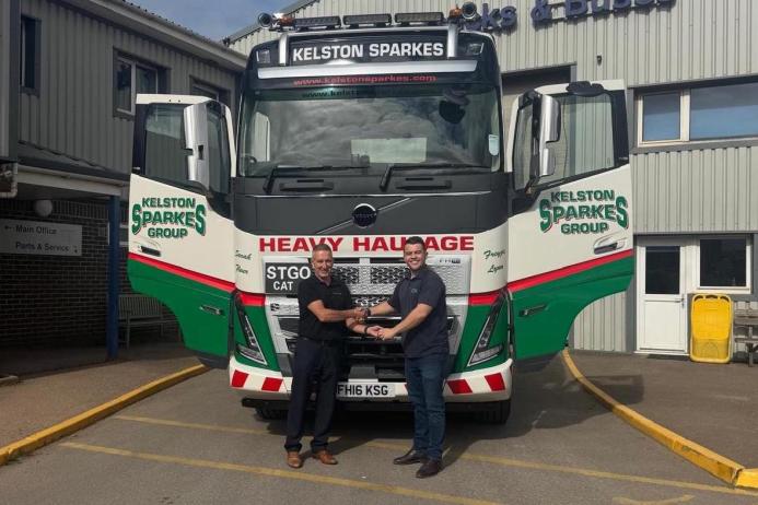 L-R: Justin Fisher handing the keys to Kelston Stark of Kelston Sparkes Group