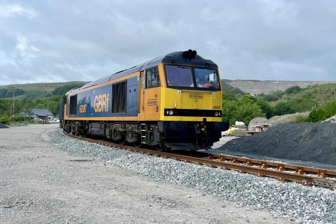The first train leaving via the newly reinstated rail link at Horton Quarry