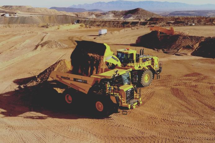 An autonomous Komatsu HD605-10 rigid dumptruck being loaded at Komatsu’s Arizona proving grounds