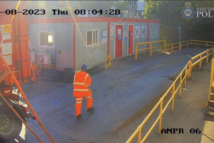 Screenshot of CCTV footage seconds before the collision. The vehicle involved is reversing in from the left-hand side of the image