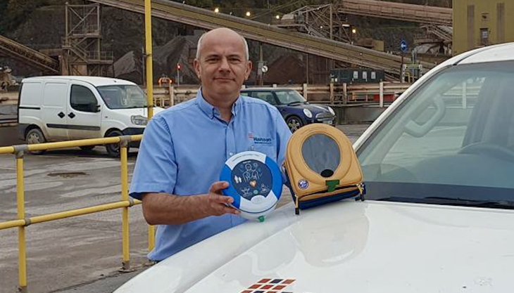 Area operations manager Justin Collis with a defibrillator at Whatley Quarry Justin Collis