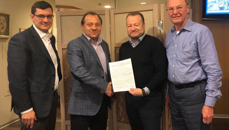 L-R: Mining Eurasia’s Ravil Dautov and Alexander Bonev with Paul Douglas and John Rotherford from Terex Trucks Terex Trucks appoint new dealer in Russia