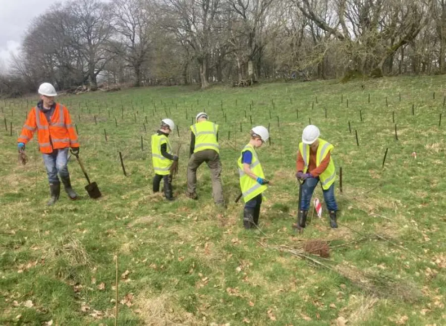 Some of the volunteers planting trees at Aggregate Industries' Hillhead Quarry in Devon