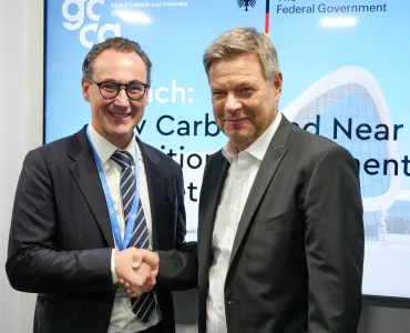 Thomas Guillot, chief executive of the GCCA (left), and German Vice Chancellor and Federal Minister for Economic Affairs and Climate Action, Robert Habeck (right)