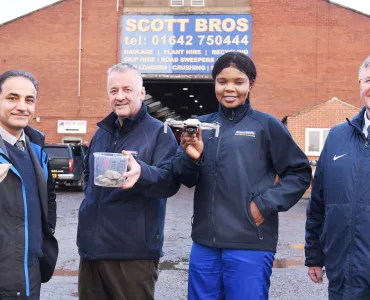 L-R: Dr Sina Rezaei Gomari, Peter Scott, KTP associate Eghe Ikponmwosa-Eweka, and Bob Borthwick with the clay that will be used in the artificial soil as well as a drone that will monitor the test site