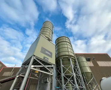 The Mevo A1 ultra-low-carbon cement production facility in Wrexham is now operating on an industrial scale