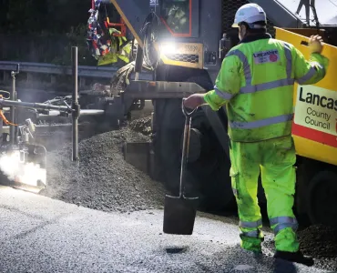 Laying of asphalt