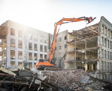 Develon DX380DM-7 demolition excavator in operation 