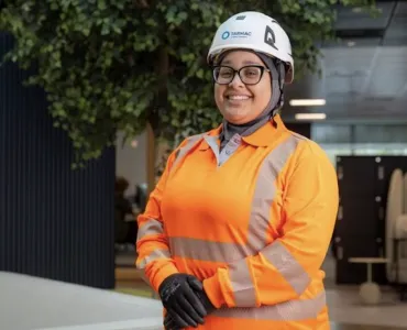 Tarmac’s Amall Saleh wearing the new PPE hijab under her hard hat