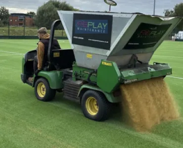 Replay Maintenance laying down Holcim UK’s ProPitch 2EW sports sand containing a proportion of recycled material