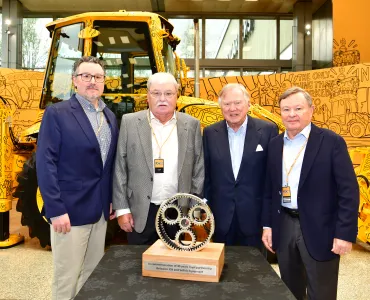 L-R: Sellick Equipment president Colin Sellick, Sellick Equipment co-founder Howard Sellick, JCB chairman Anthony Bamford, and Sellick Equipment co-founder David Sellick 