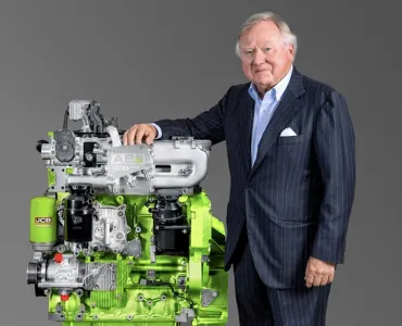 JCB chairman Anthony Bamford with one of the company’s hydrogen engines