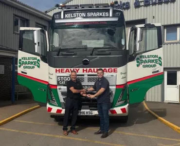 L-R: Justin Fisher handing the keys to Kelston Stark of Kelston Sparkes Group