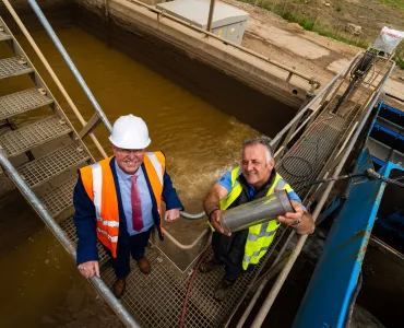 L-R: Bob Borthwick and Peter Scott with a modified 10-micron filter that allows Scott Bros’ wash plant to operate solely using recycled water