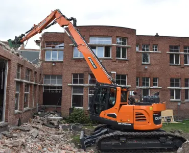 Belgium-based De Schepper Kris’s new Develon DX140RDM-7 demolition excavator at work 