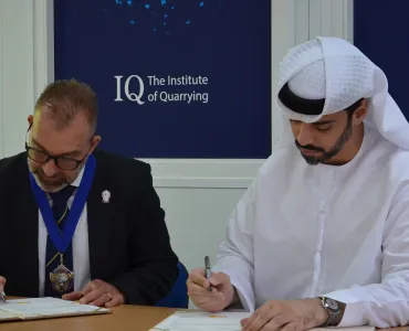 IQ President Ben Williams signing the MoU with Nahayan Alteneiji, chief executive officer of UAE’s National Safety Institute 