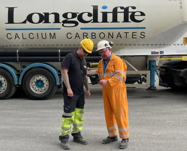 L-R: Michael Mosely, warehouse and planning team leader at IKO, and Longcliffe driver Chris Pugh