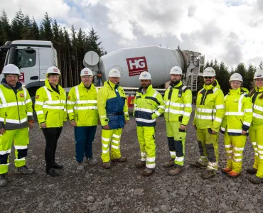 The Mill Rig wind farm project team (L-R): Andrew Grant, mixer driver, Hillhouse Quarry Group; Caroline Woodburn, operations manager - transport and distribution, Hillhouse Quarry Group, Joe Campbell, general manager - concrete, Hillhouse Quarry Group; Scott Lindsay, general foreman, RJ McLeod; Shakthivelu Thanghavel, project manager, RJ McLeod; Peter Gallagher, sub agent, RJ McLeod; Kevin Mapes, head engineer, RJ McLeod; Emilia Zalupska, graduate engineer, RJ McLeod; and Christin Stewart, engineer, RJ McLe
