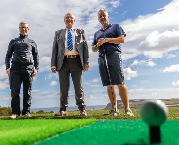 L-R: Greg Fitzmaurice, Hunley Golf Club's general manager, with Scott Bros directors Bob Borthwick and Peter Scott on the newly designed driving range