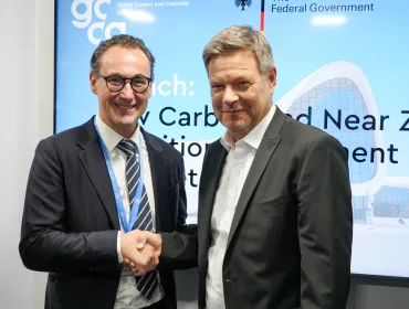 Thomas Guillot, chief executive of the GCCA (left), and German Vice Chancellor and Federal Minister for Economic Affairs and Climate Action, Robert Habeck (right)