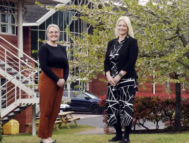 L-R: Emma Turner with Terri Charles outside the Business Innovation Centre in Binley, where Cemex have opened a new training facility and office space