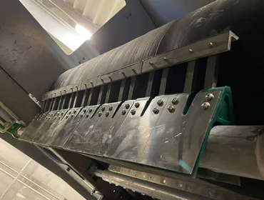 STARCLEAN® belt cleaners installed on one of the belts on site