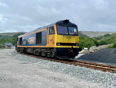 The first train leaving via the newly reinstated rail link at Horton Quarry