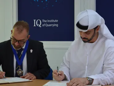 IQ President Ben Williams signing the MoU with Nahayan Alteneiji, chief executive officer of UAE’s National Safety Institute 