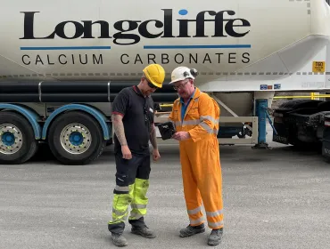 L-R: Michael Mosely, warehouse and planning team leader at IKO, and Longcliffe driver Chris Pugh
