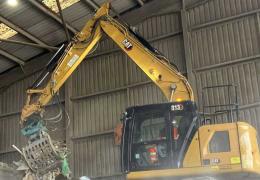 One of the Cat 313 excavators operating for L&S Waste Management