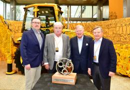 L-R: Sellick Equipment president Colin Sellick, Sellick Equipment co-founder Howard Sellick, JCB chairman Anthony Bamford, and Sellick Equipment co-founder David Sellick 