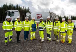 The Mill Rig wind farm project team (L-R): Andrew Grant, mixer driver, Hillhouse Quarry Group; Caroline Woodburn, operations manager - transport and distribution, Hillhouse Quarry Group, Joe Campbell, general manager - concrete, Hillhouse Quarry Group; Scott Lindsay, general foreman, RJ McLeod; Shakthivelu Thanghavel, project manager, RJ McLeod; Peter Gallagher, sub agent, RJ McLeod; Kevin Mapes, head engineer, RJ McLeod; Emilia Zalupska, graduate engineer, RJ McLeod; and Christin Stewart, engineer, RJ McLe