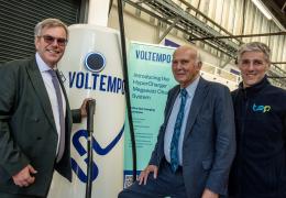 L-R: Michael Boxwell, chief executive officer of Voltempo, Sir Vince Cable, chair of the eFREIGHT 2030 consortium; and David Horsfall, director of property and sustainability at Tyseley Energy Park, celebrate the start of series production for the UK-built Voltempo HyperCharger at Tyseley Energy Park, Birmingham