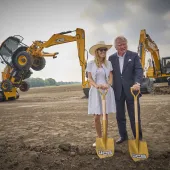 Lord Bamford with his daughter Alice at the ground-breaking ceremony