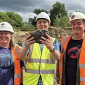 L-R: Sally Hollingworth, Dr Stephen Zhang, University of Bristol, and Dr Neville Hollingworth celebrate the discovery of a mammoth tooth