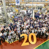 JCB Power Systems employees celebrate the company’s 20th birthday at the plant in Foston, Derbyshire