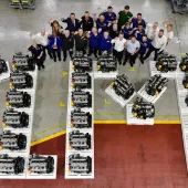 Employees at JCB Power Systems in Foston, Derbyshire, celebrate the production of JCB’s one-millionth engine