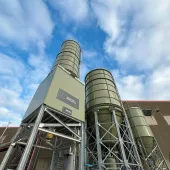 The Mevo A1 ultra-low-carbon cement production facility in Wrexham is now operating on an industrial scale