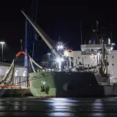 The cement carrier 'NACC Indian' discharging the first shipment of bulk cementitious product