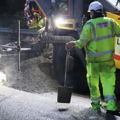 Laying of asphalt