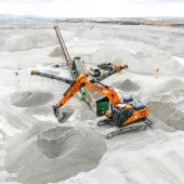 The trial took place at Holcim UK’s Lee Moor sand and gravel quarry, near Plymouth, and involved a 23-tonne Develon crawler excavator fitted with autonomous technology from Gravis Robotics